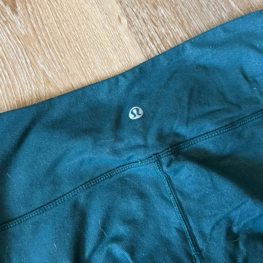 Lululemon vintage low waisted‎ teal green leggings size 4